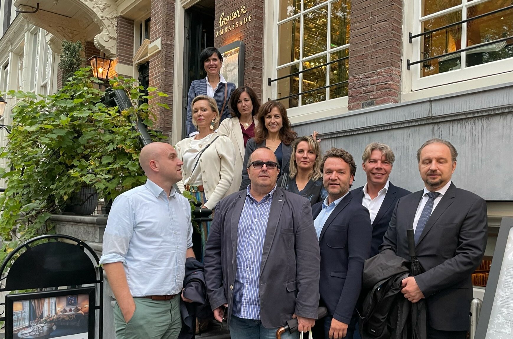 Group of people in front of a restaurant